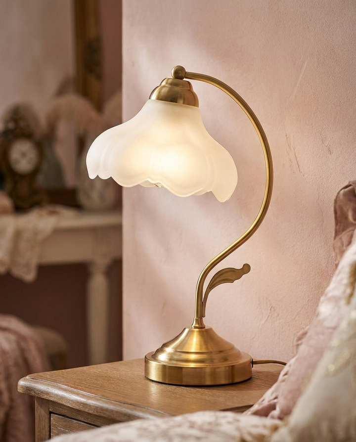 Frosted Glass Flower Lamp against a blush pink wall